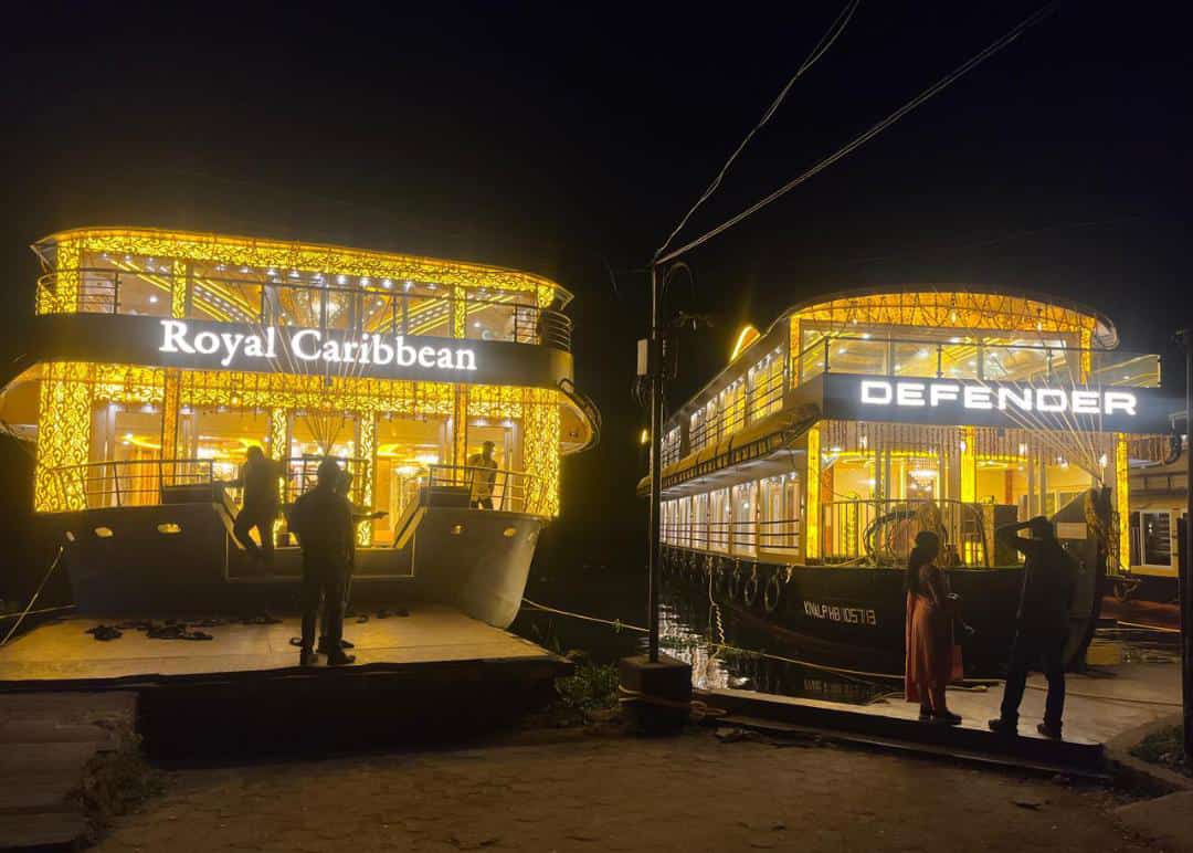 Sharing houseboat cruise on Alleppey backwaters Kerala at sunset